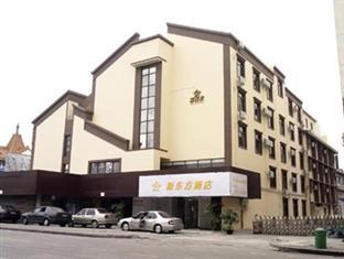 New East Hotel Csuhaj Kültér fotó